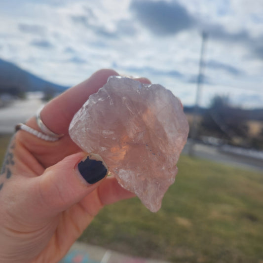 Raw rose quartz palm sized